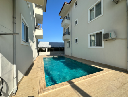 130 M2 3 1 Möblierte Wohnung Zum Verkauf Mit Pool In Ortaca Karaburun, Mugla.