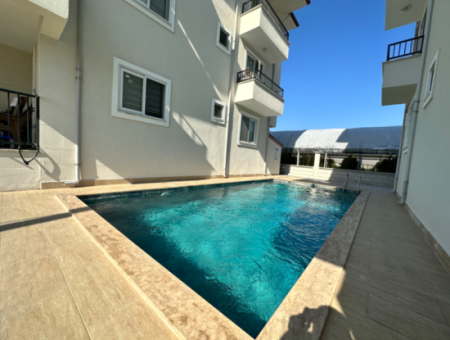 130 M2 3 1 Möblierte Wohnung Zum Verkauf Mit Pool In Ortaca Karaburun, Mugla.