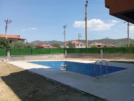 1 1 Apartment For Sale With Pool In Ortaca Karaburun Neighborhood